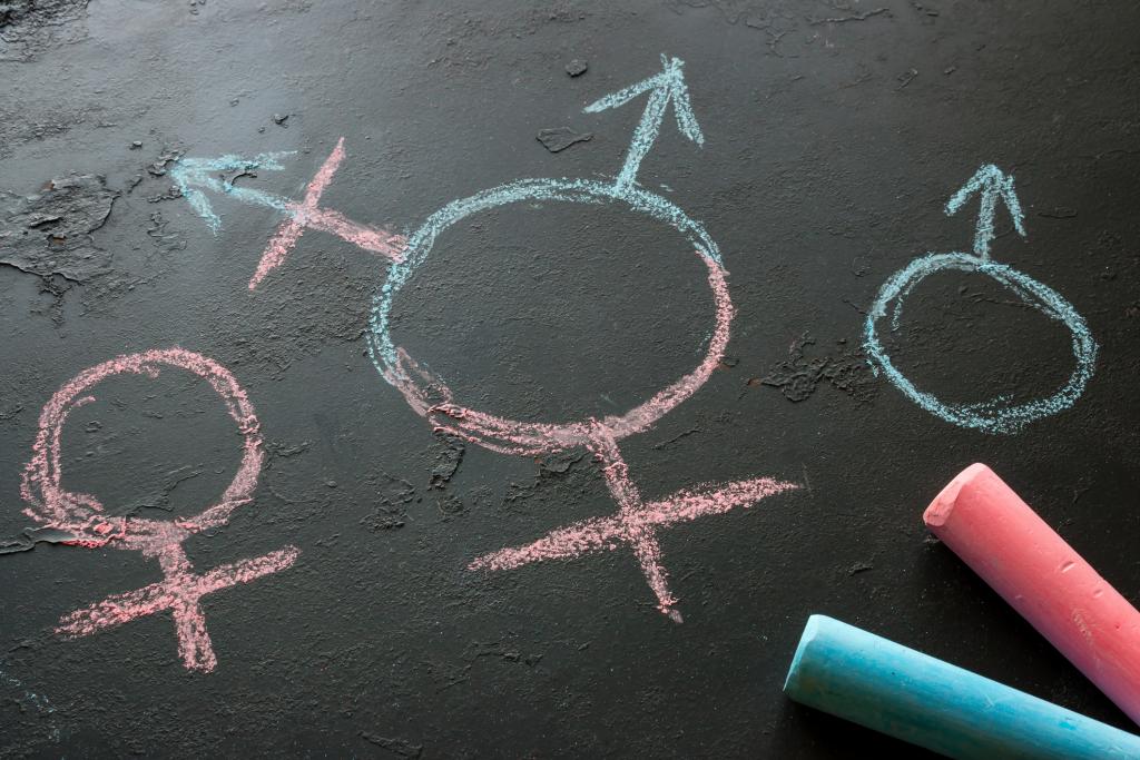 Male, female and intersex symbols drawn with chalk