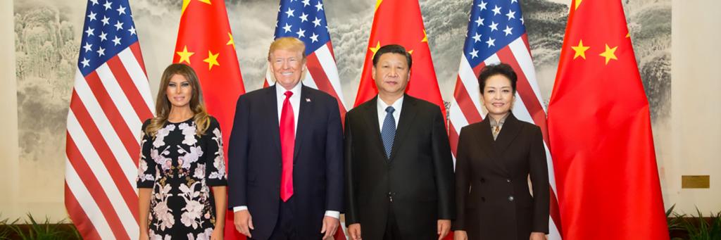 Donald Trump poses for a photo with Xi Jinping of China