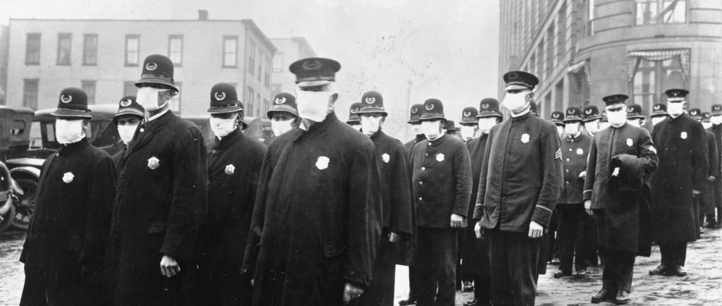 seattle policemen wear masks to protect from the Spanish Flu of 1918
