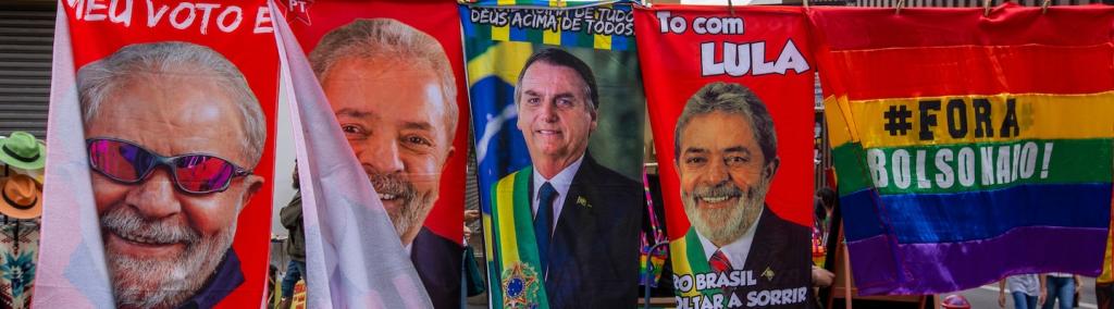 Street vendors sell towels and posters with the images of presidential candidates Luiz Inácio Lula da Silva and Jair Bolsonaro in São Paulo, Brazil, on 17 July 2022.