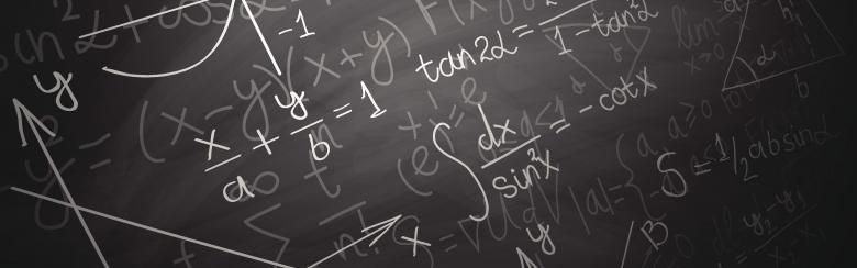 Physics formulas on a blackboard