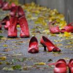 Red shoes united against violence on women © MikeDotta / Shutterstock.com